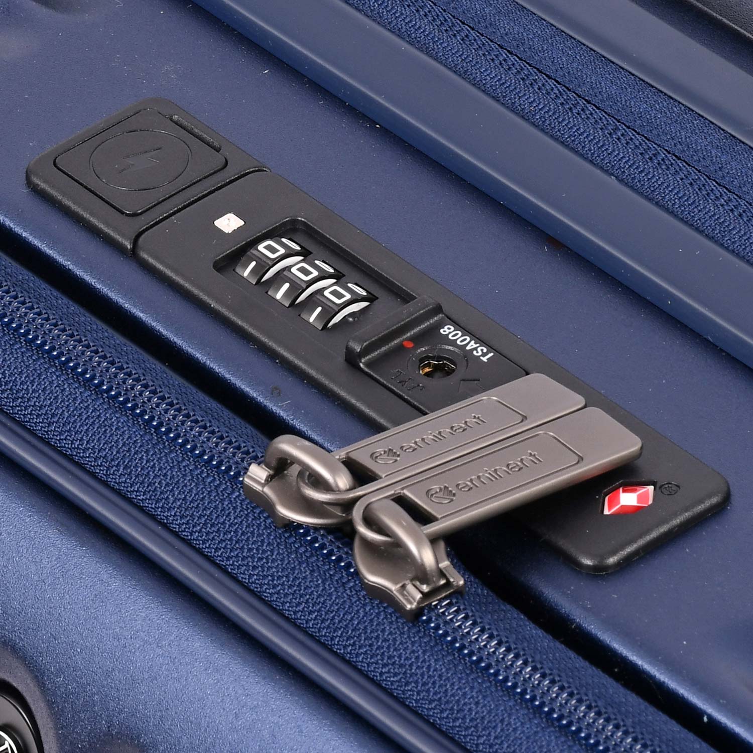 A dark blue, ribbed, hard-shell Eminent Alfred KK70 suitcase with a telescopic handle, spinner wheels, and a top carrying handle.