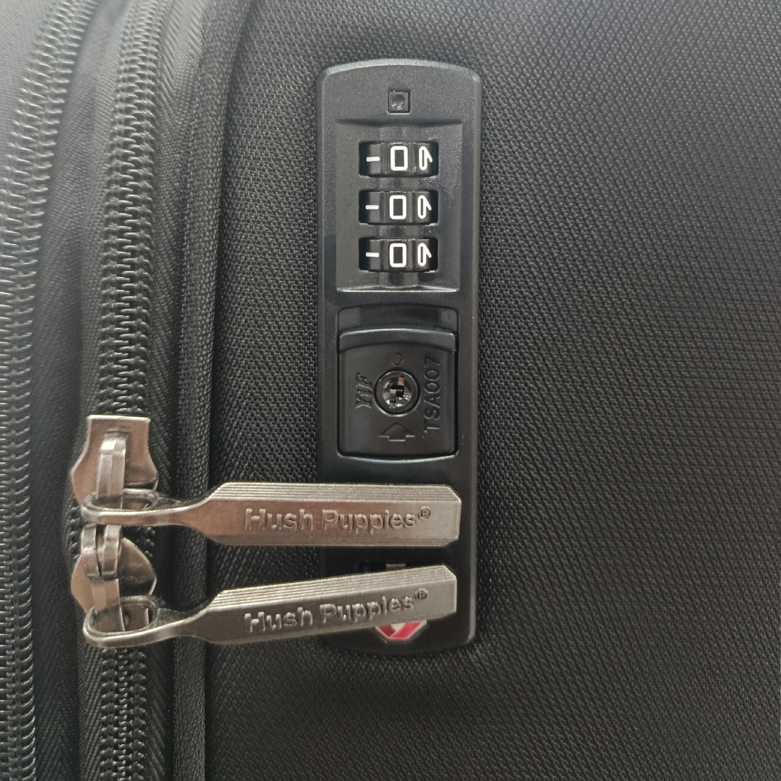 Hush Puppies 69-3149 Montreal Pop lightweight black checked in  luggage suitcase